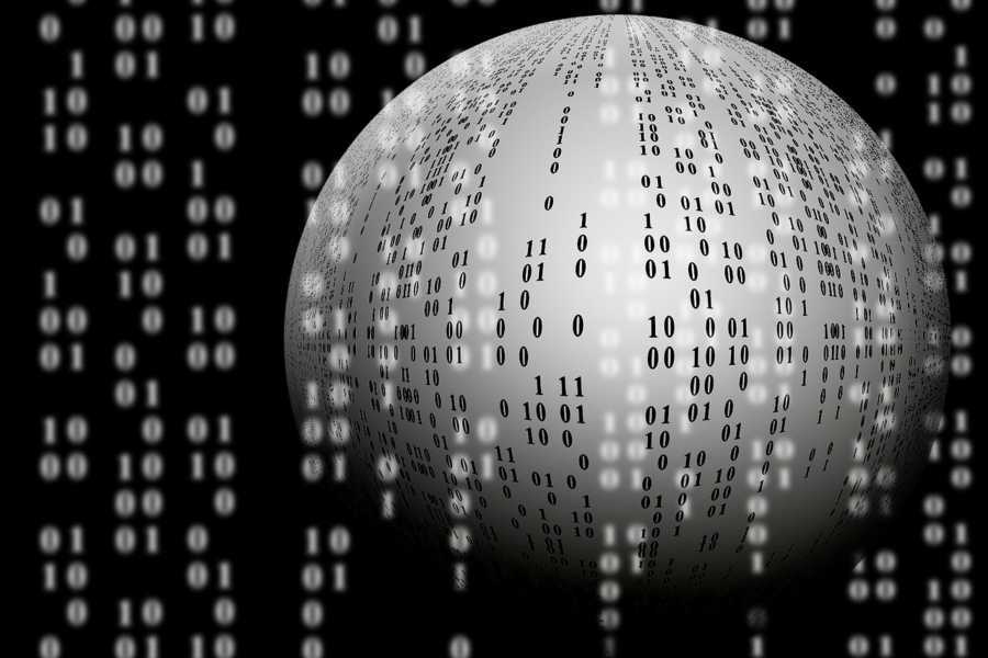 Graphic of binary code on screen over a blank globe in the background