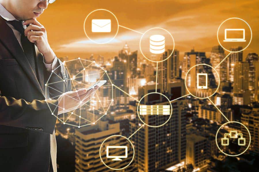 A San Marcos TX managed IT service provider monitors the status of a client's network through his phone.